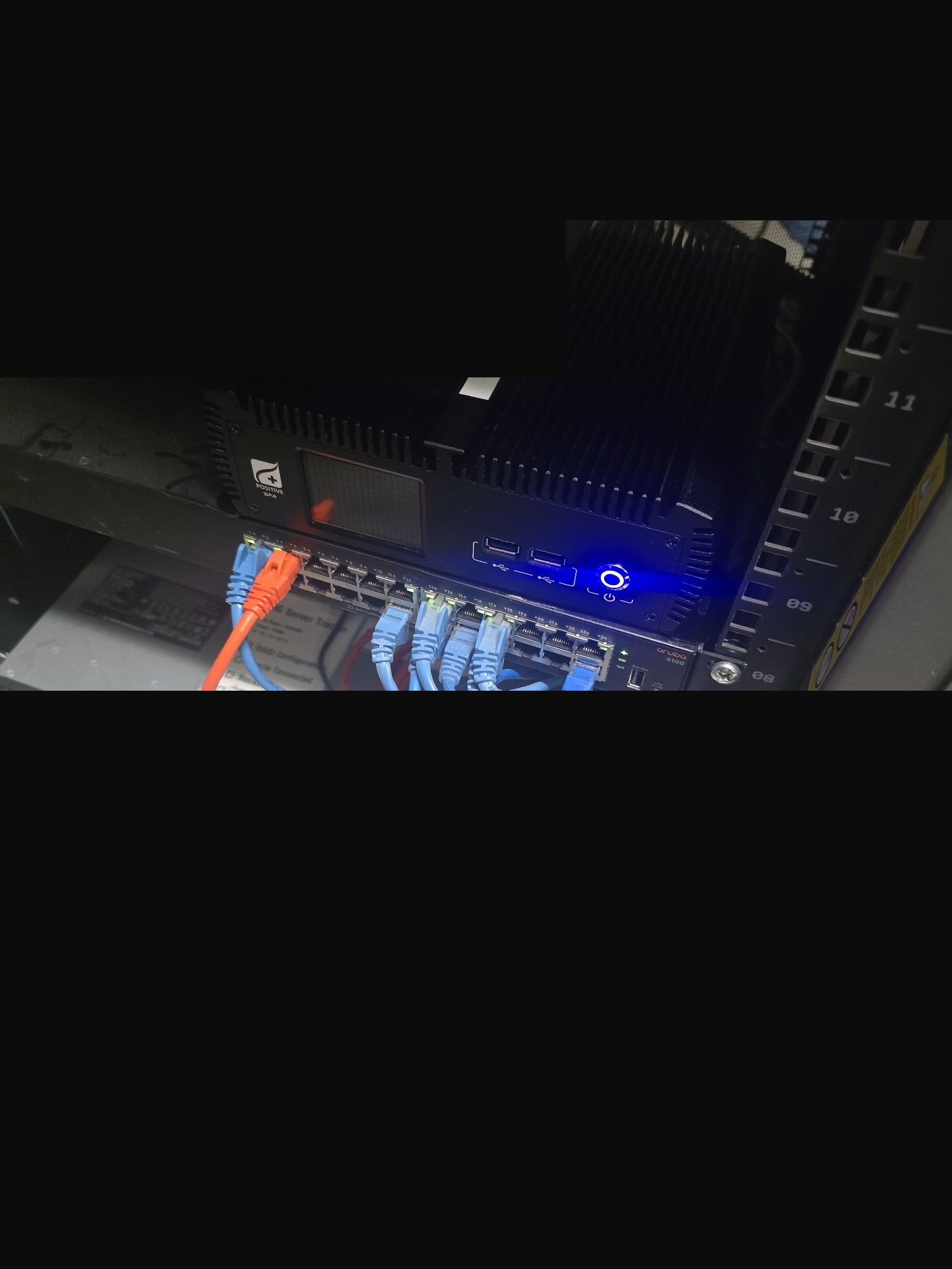 Commercial rack with Fortinet firewall, FortiSwitch, and Crown audio amplifier for AV and network integration
