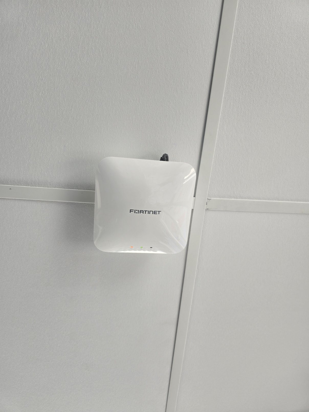 Fortinet wireless access point ceiling mount for commercial Wi-Fi infrastructure in West Texas